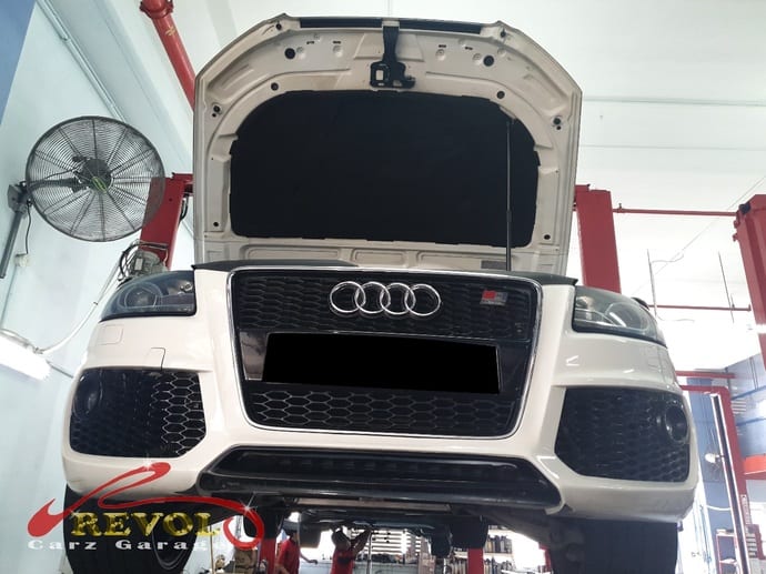 The Audi A5 emitting white smoke on start-up when towed in.
