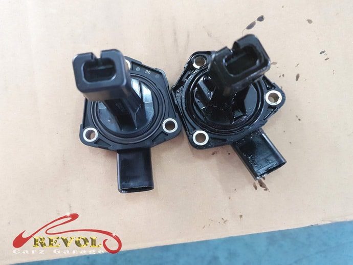 The faulty oil level sensor that had been sending false low readings.