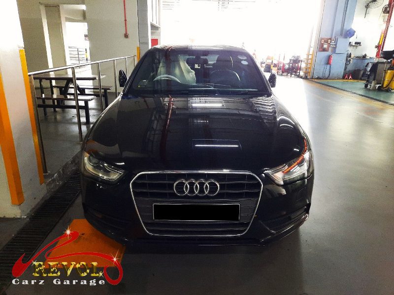 Audi A4 parked at the workshop, in for an oil leak diagnosis.