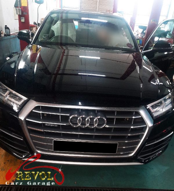 Audi Q3 parked at the workshop, in for aircon compressor inspection.