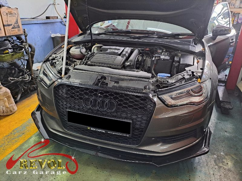 Audi A3 parked at the workshop for professional servicing.