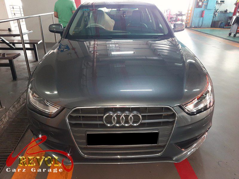 Audi A4 parked at the workshop, in for an oil leak diagnosis.