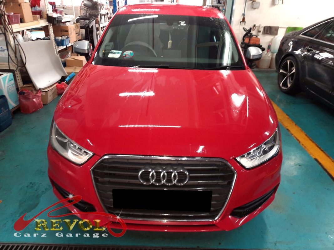 Audi A1 parked at the workshop, in for front shock absorber inspection.