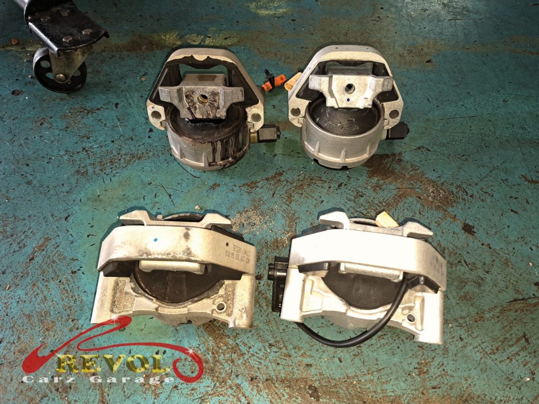 The gearbox mount removed showing the play under load.
