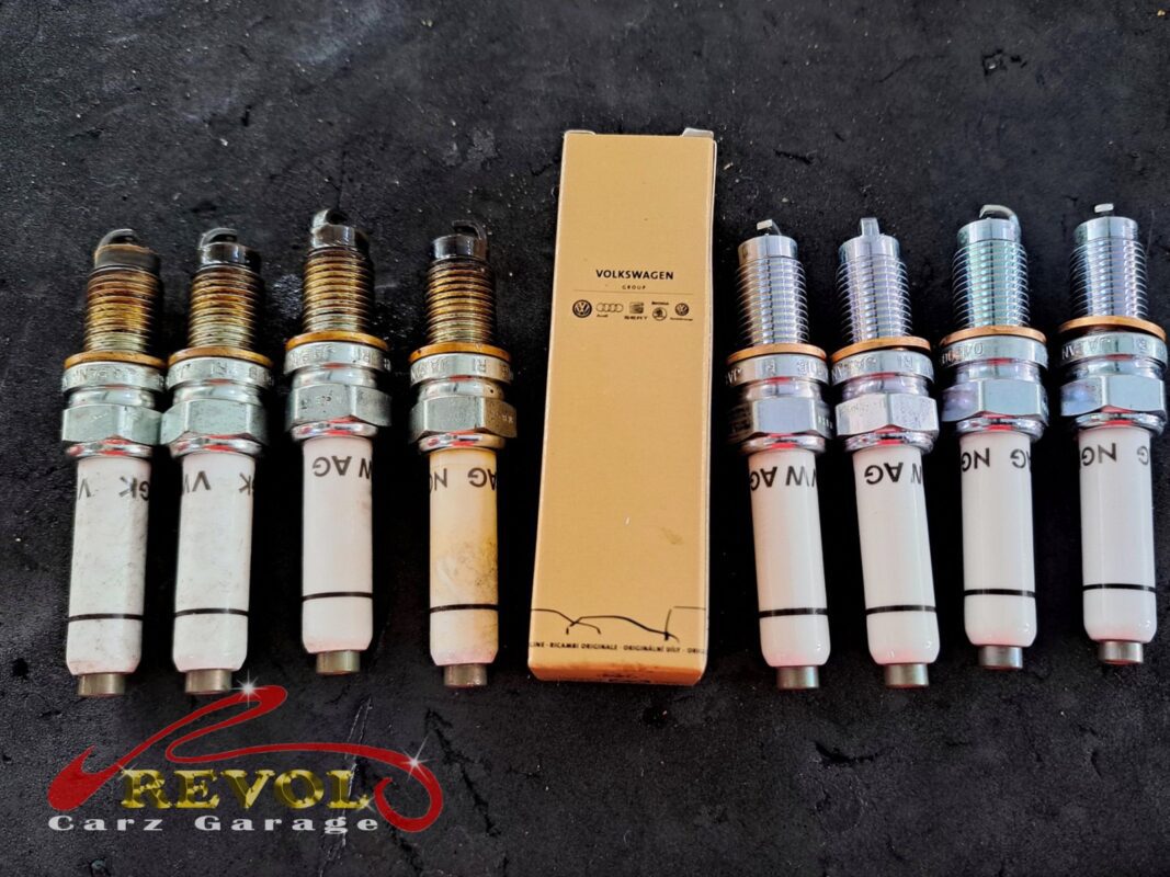 The new Audi-spec spark plugs and ignition coils ready to fit.