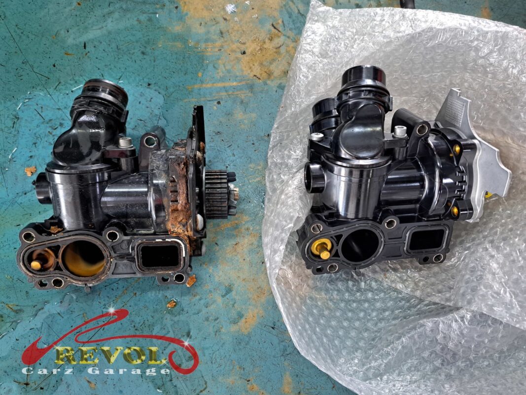 The new Audi-spec water pump and thermostat ready to fit.