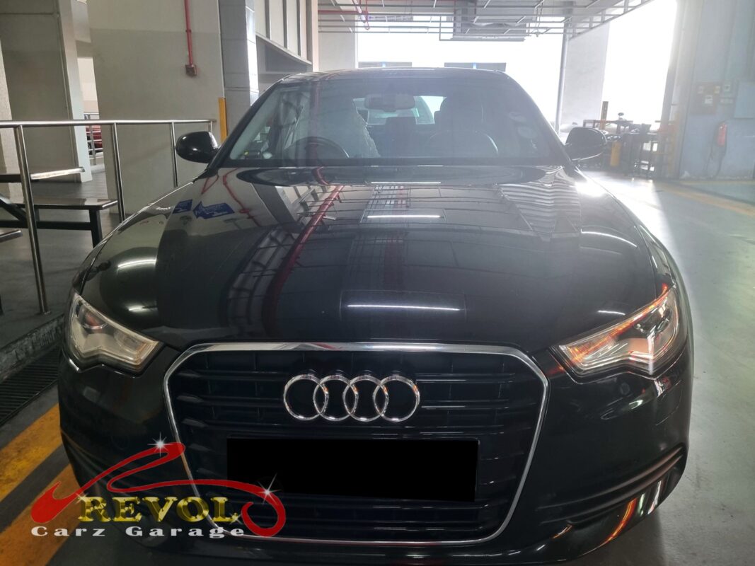 Audi A6 parked at the workshop, in for shock absorber inspection.