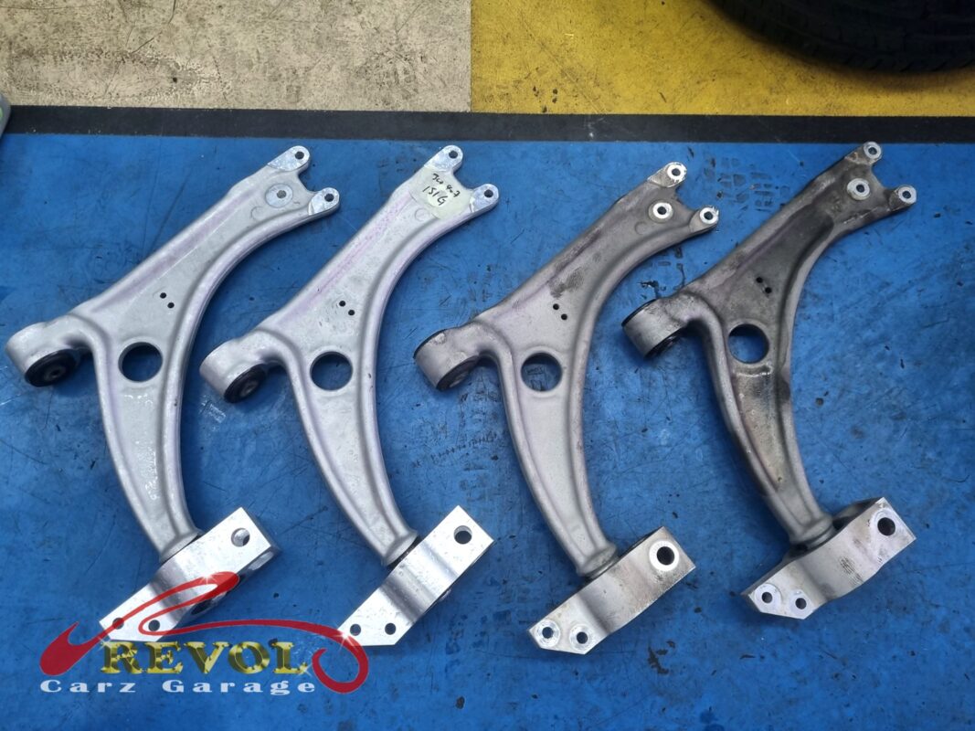 The new Audi-spec lower arms with fresh bushes and ball joints ready to fit.