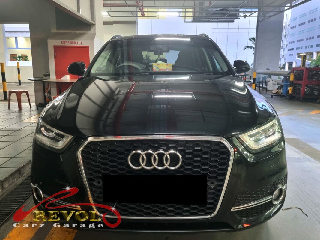 Audi Q3 parked at the workshop, in for alternator replacement.