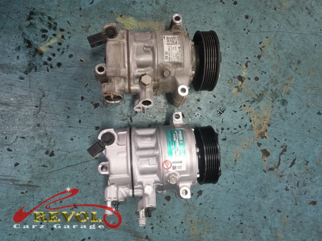 The old alternator removed from the engine.