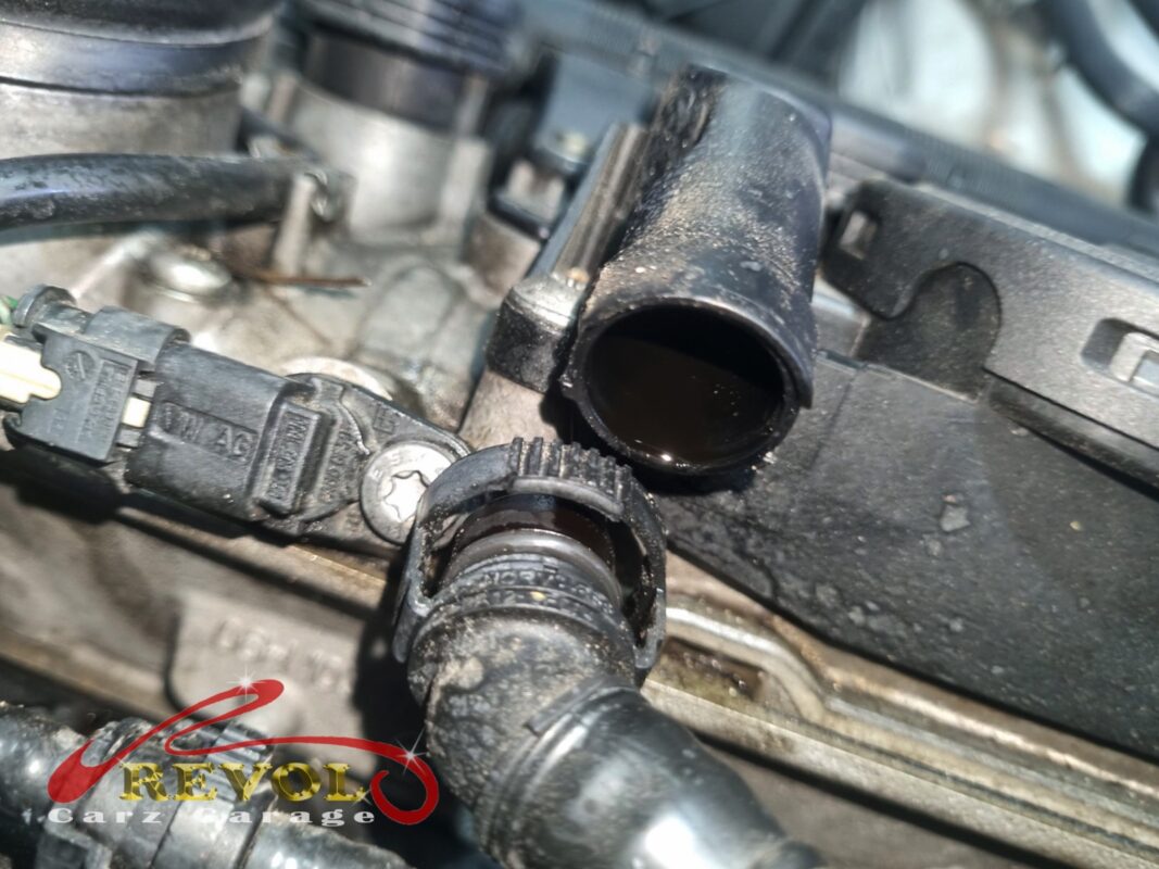 Oil and breather residue around the oil separator on the Audi A5.
