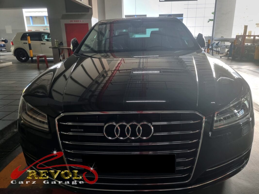 Audi A8 parked at the workshop, in for front brake pad replacement.