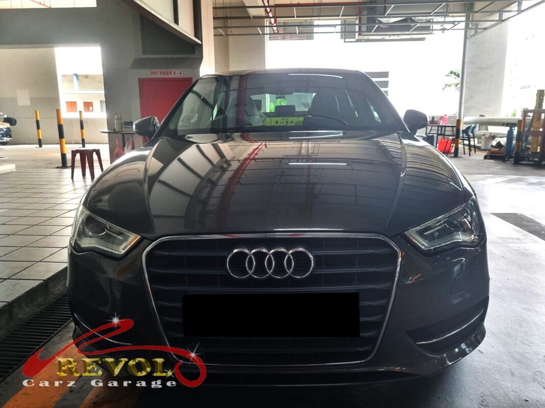 Audi A3 with the engine cover off for oil separator replacement.