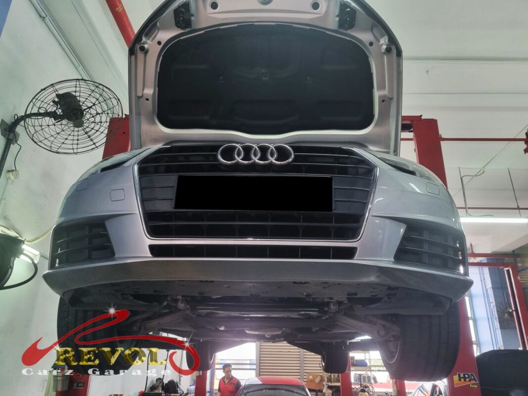 A4 engine bay opened for AC compressor access.