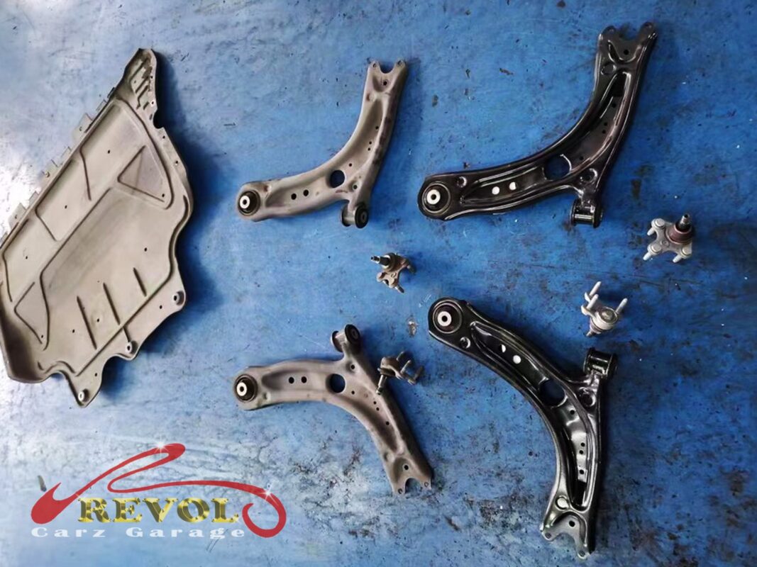 New Audi-spec lower arms ready for installation.
