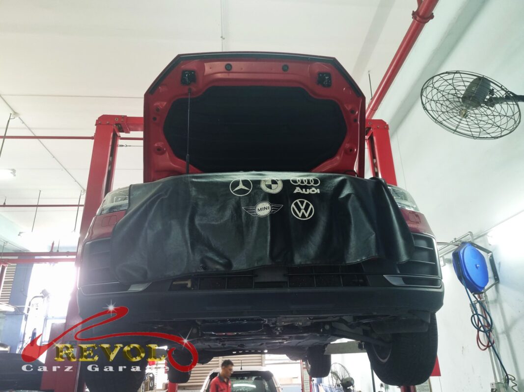 Q2 up on the lift for underbody and brake inspection.