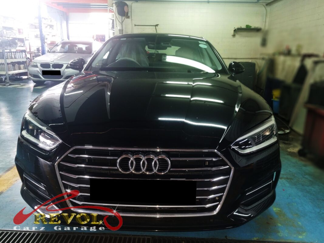 Audi A5 on the lift for front lower control arm replacement.