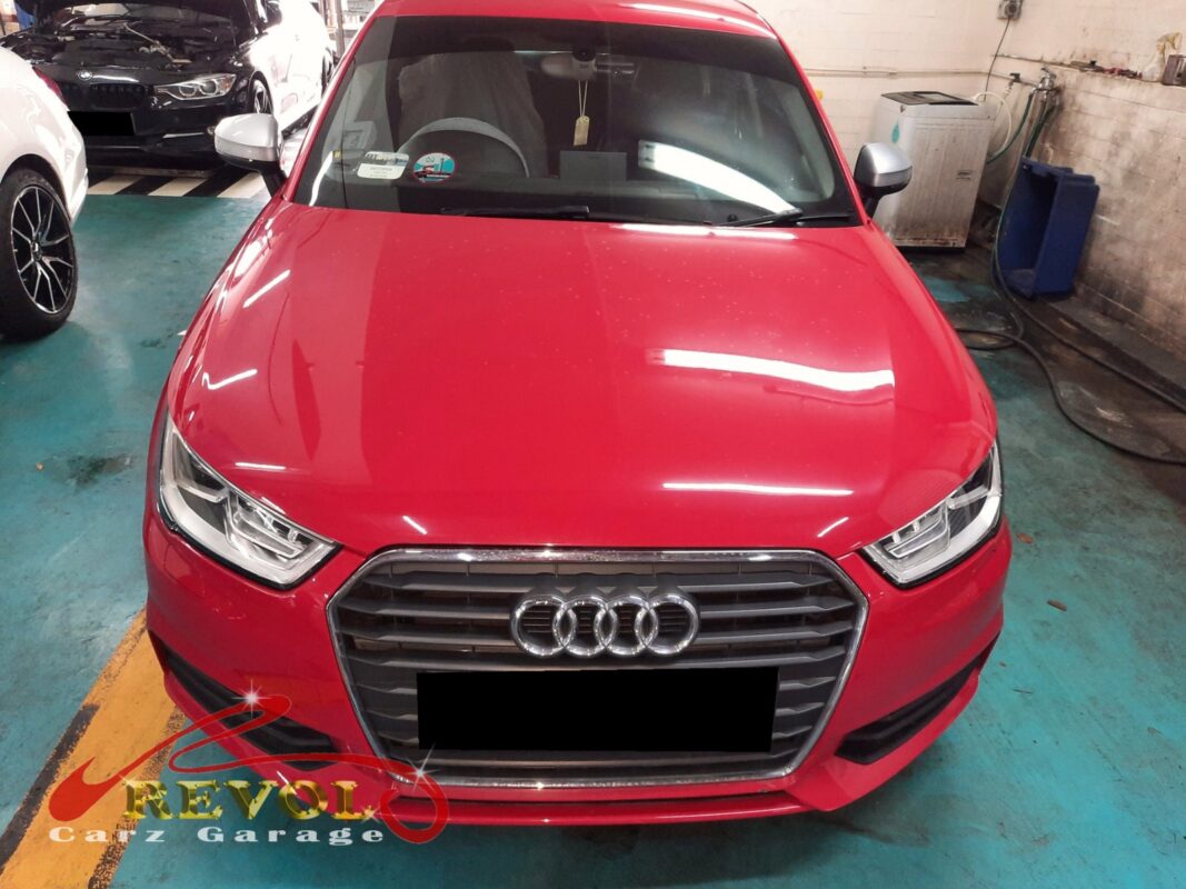 Audi A1 on the lift for driveshaft boot replacement.