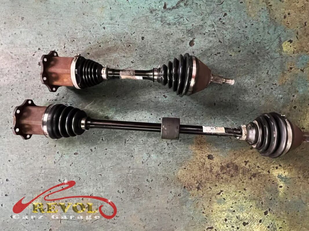 CV joint cleaned of old grease and ready for inspection.