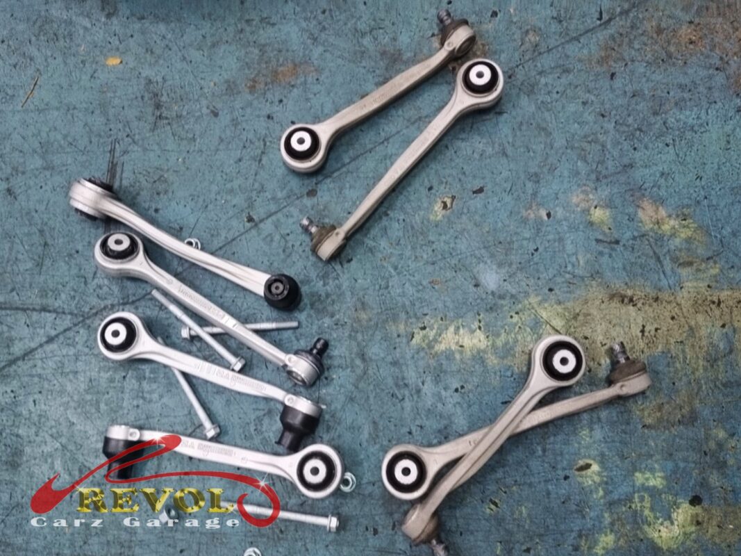 New Audi-spec upper arm pair ready for installation.