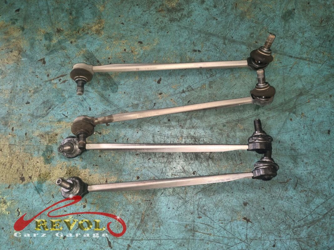 The full set of new VAG-spec anti-roll bar links laid out before fitting. They wear together, so all of them went in.