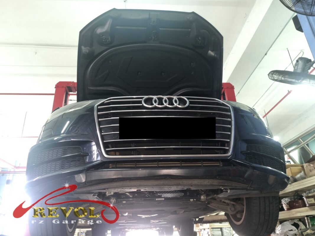 The Audi A4 up on the two-post lift, ready for the timing cover work.