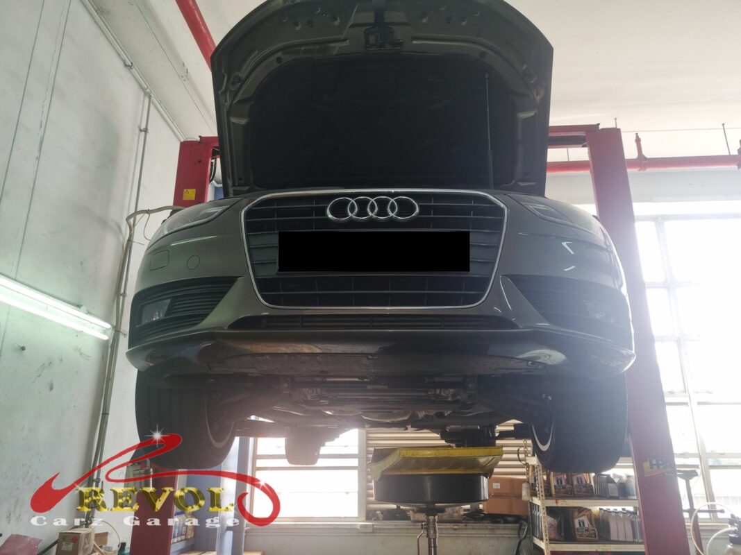 The Audi A4 up on the two-post lift, ready for the front-end strip-down.