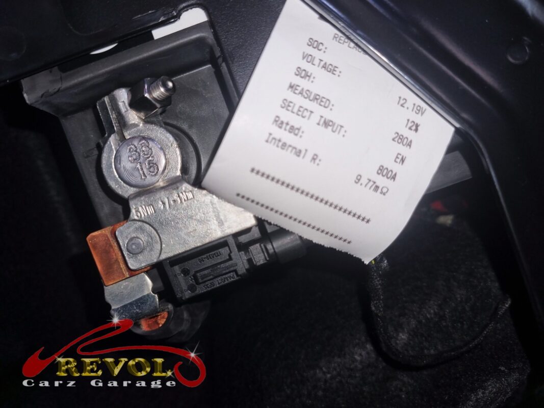 The battery tester's verdict, printed off at the terminal: 12.19V resting, internal resistance up at 9.77 milliohms, header reading 'replace'.