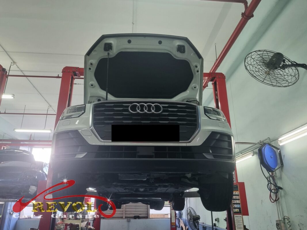 The Audi Q2 up on the two-post lift, in for the oil separator job.