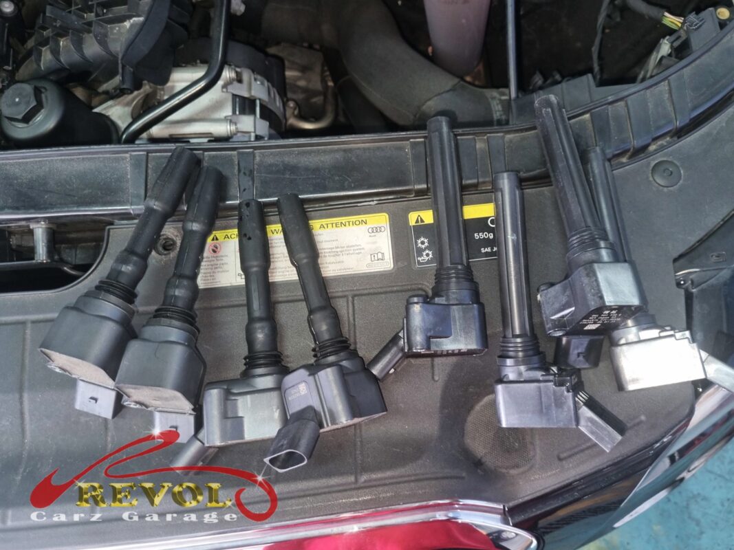 The ignition coils, the old set (left) and the new VAG-spec replacements (right). All four went in together.