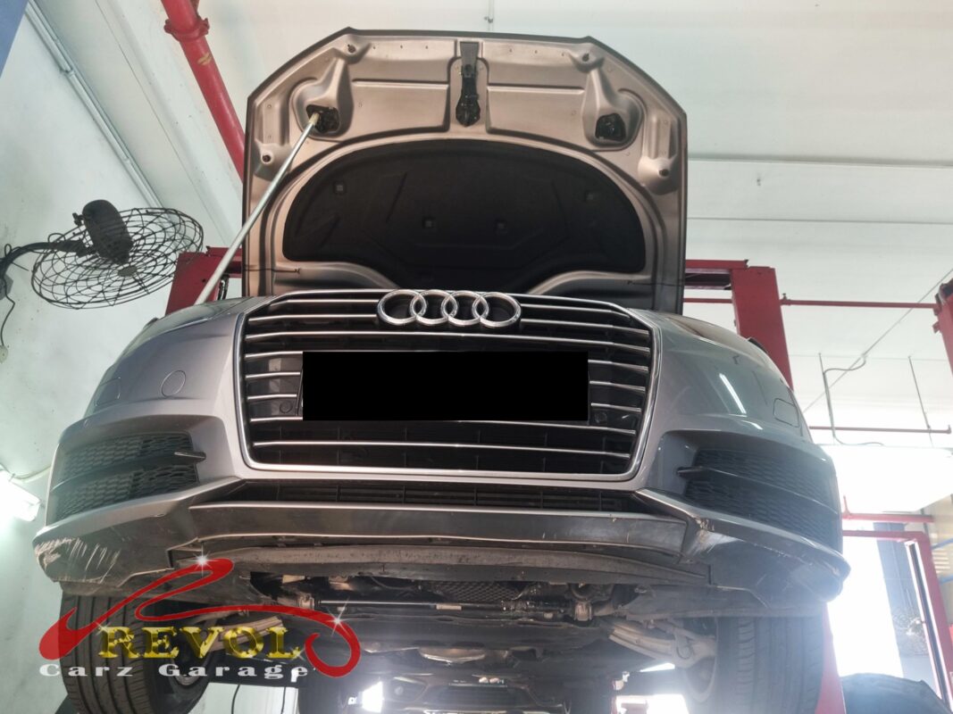 The Audi A6 up on the two-post lift, in for the thermostat job.
