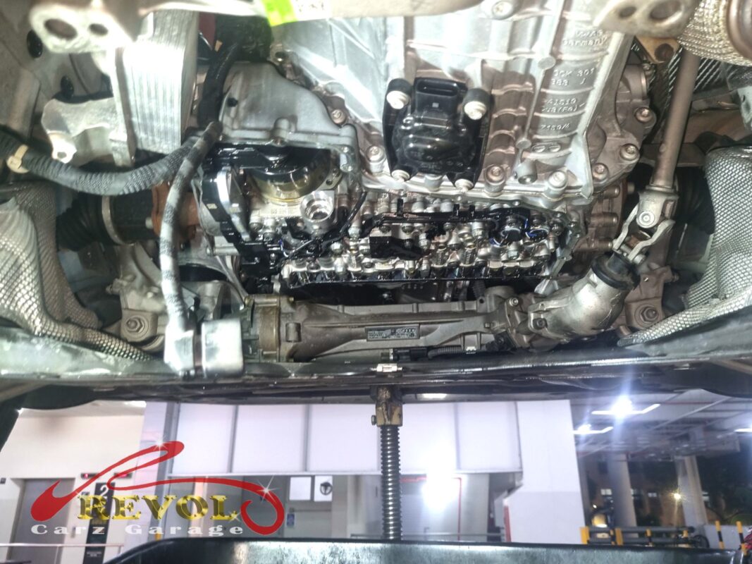 The ATF pan off, the transmission's valve body exposed underneath.