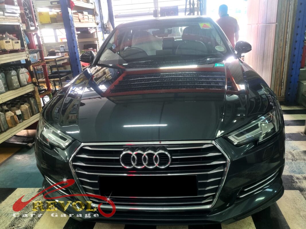 Audi A4 with the dashboard partially dropped for evaporator core access.