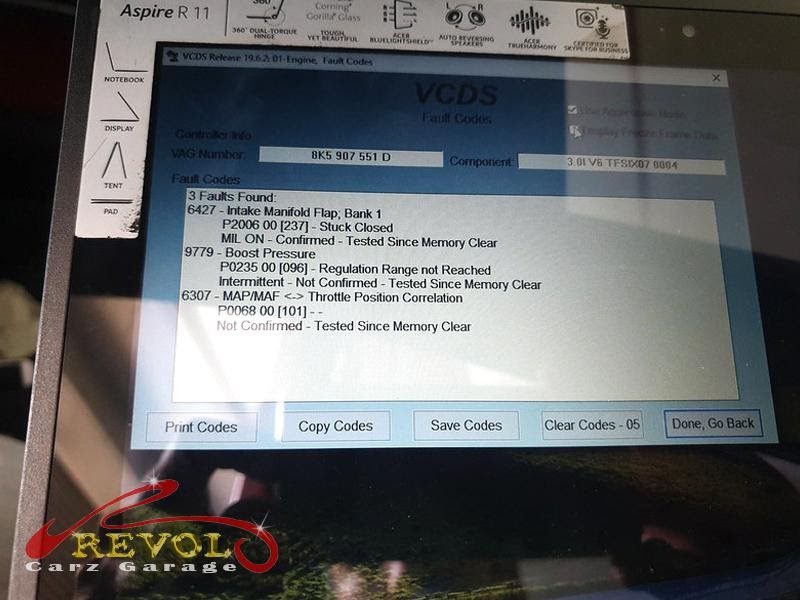 The Audi scan tool connected to the S5 reading the intake manifold fault.