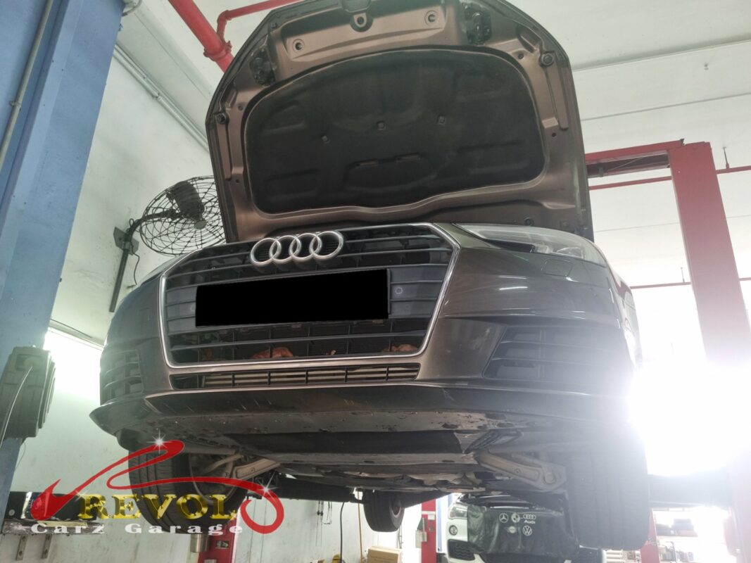 The Audi A4 up on the two-post lift, in for the cooling system job.