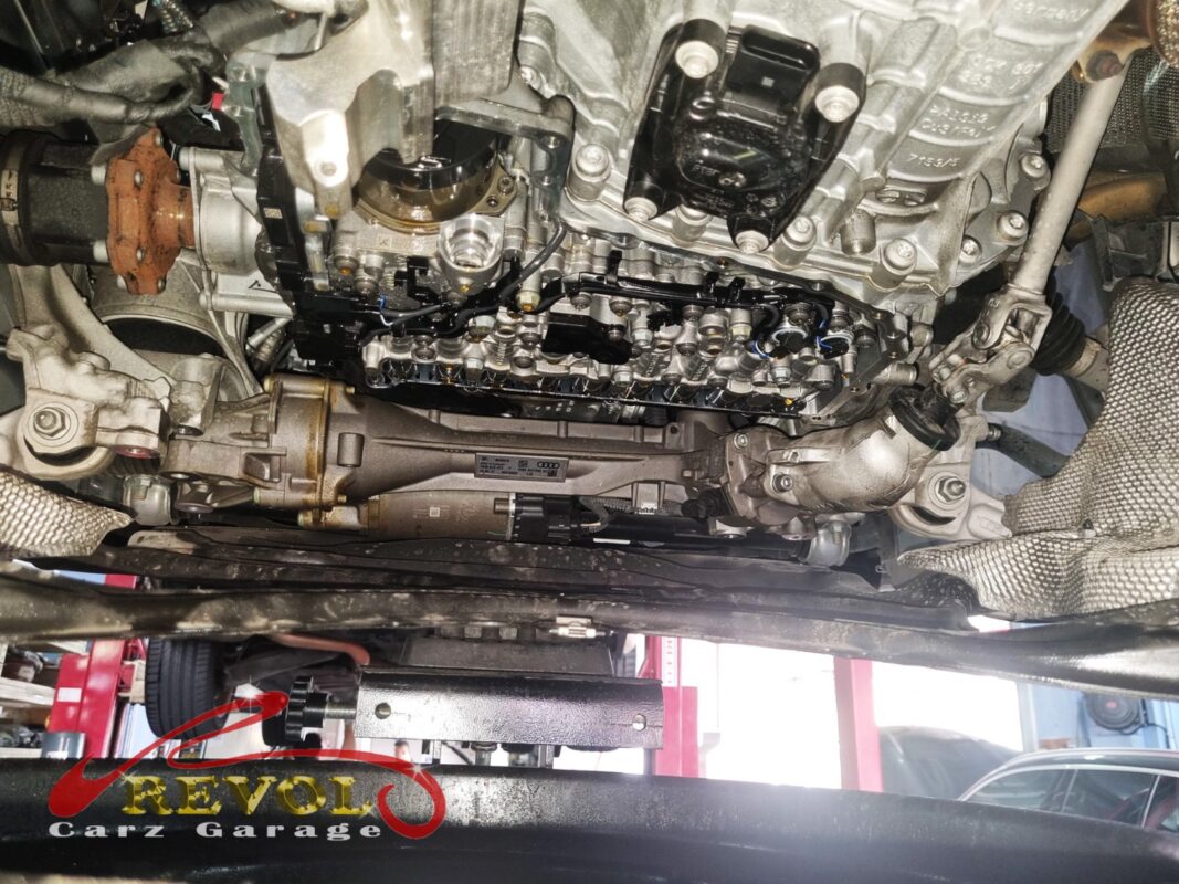 The ATF pan off, the transmission's valve body exposed underneath.