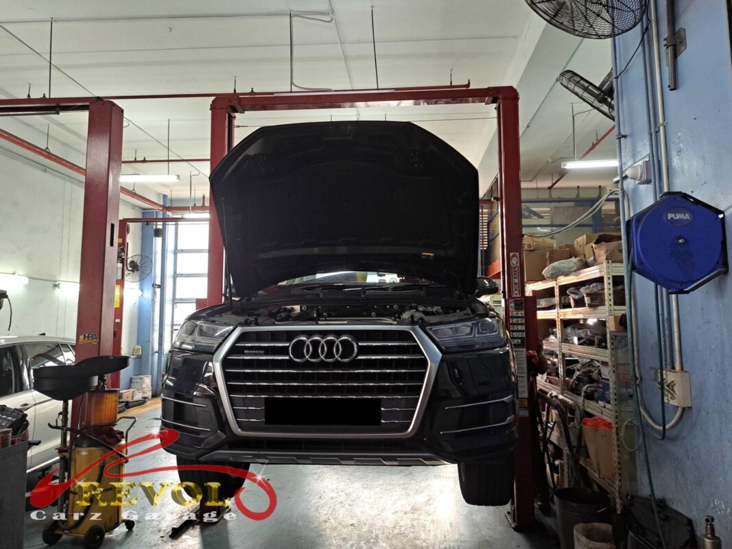 The Audi Q7 up on the two-post lift, in for the front suspension work.