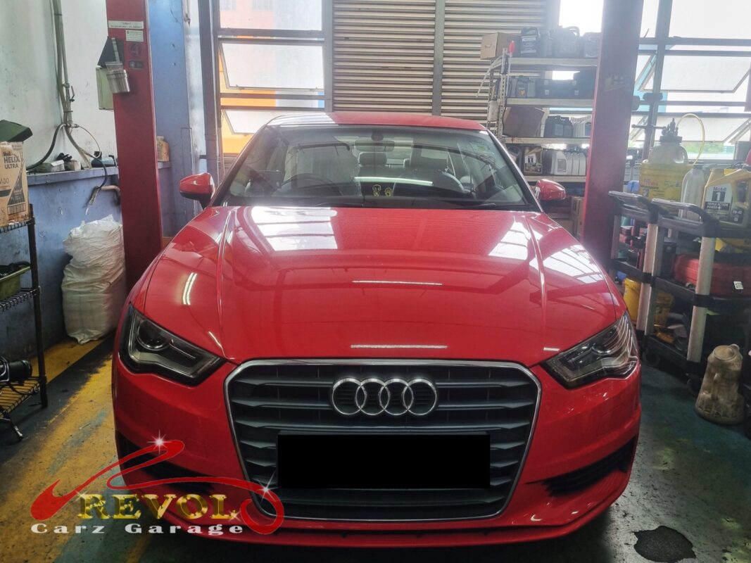 Audi A3 on the workshop lift for rear shock absorber set replacement.
