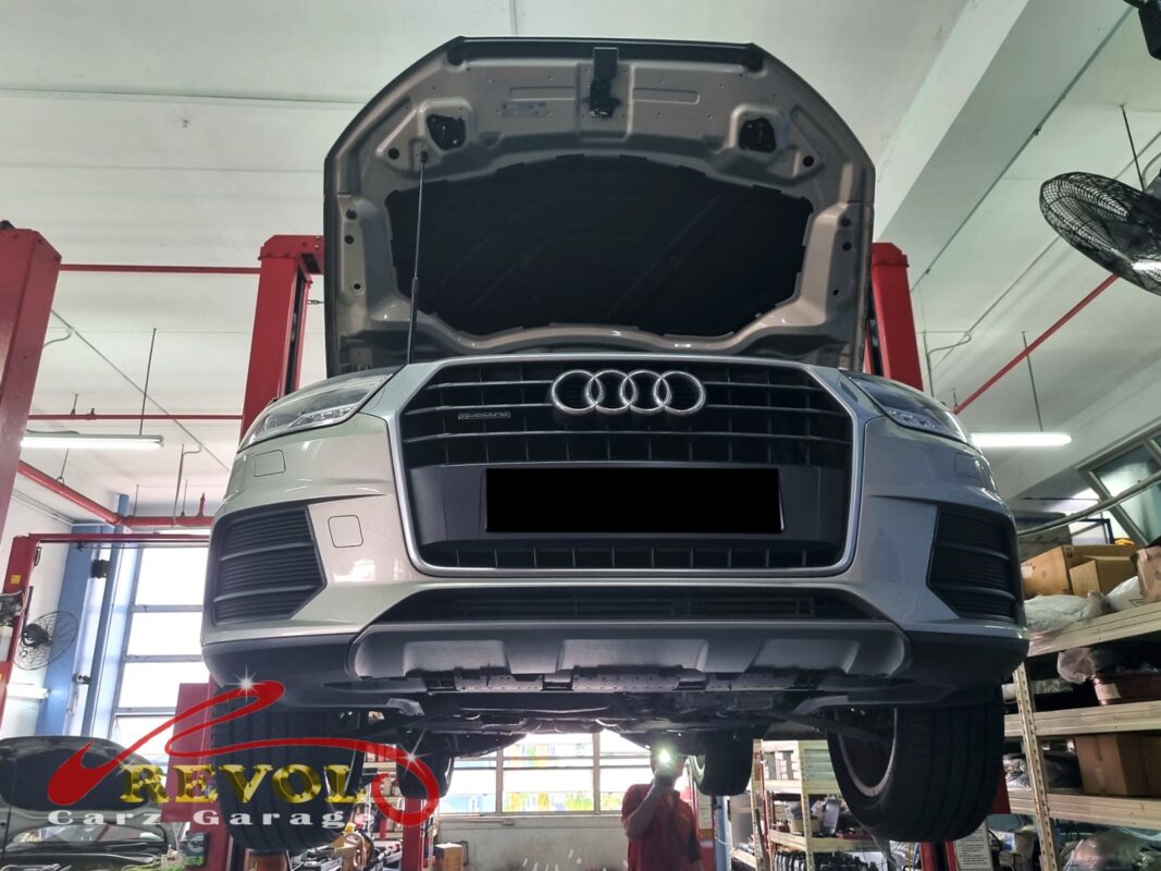 The Audi Q3 up on the two-post lift, in for the front suspension work.