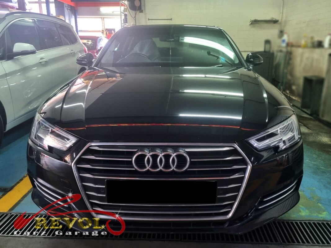 Audi A4 at the Revol Carz workshop, front wheel off for the wheel bearing replacement.