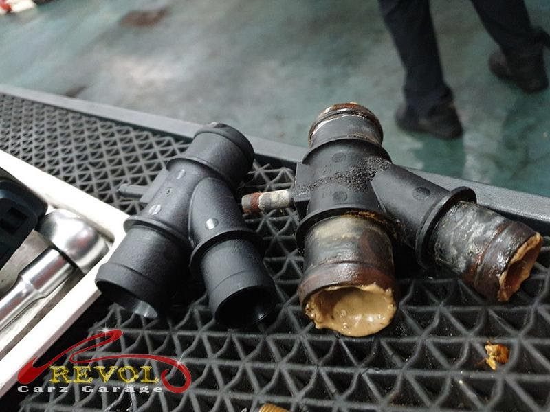 The old failed turbo diverter valve removed from the engine.