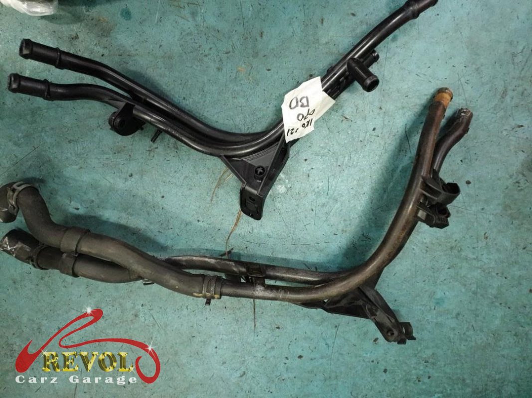 The new genuine VW-spec coolant hoses and clamps ready to fit.