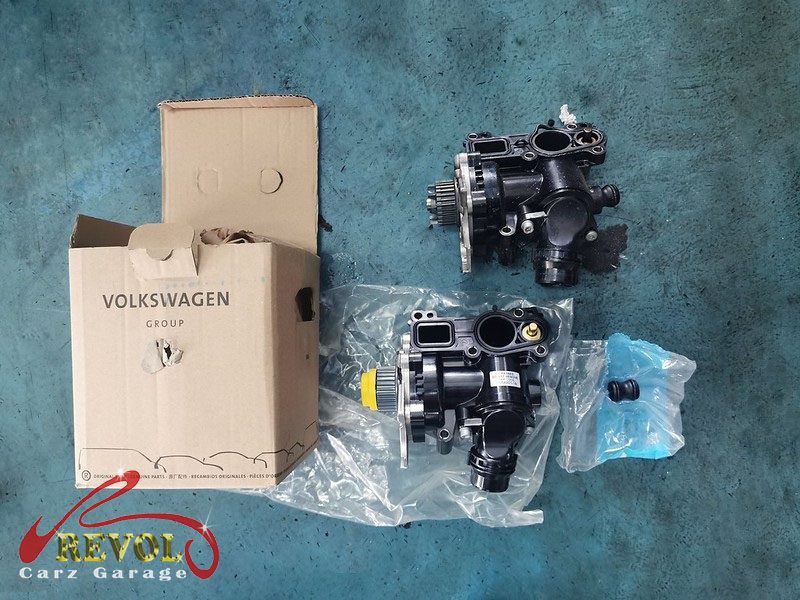 The new genuine Audi-spec coolant flange with fresh seal ready to fit.