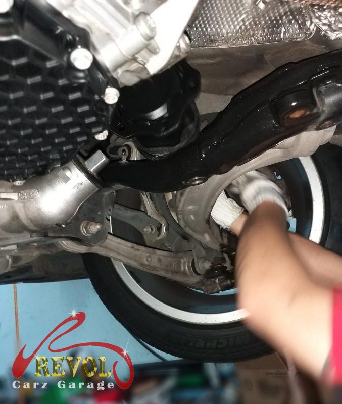The new shaft installed with a fresh hub nut, torqued to spec.