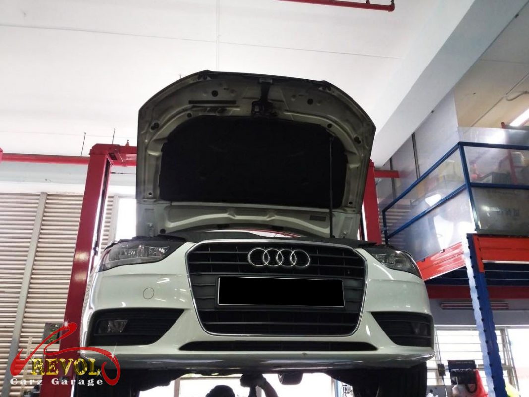 Audi A4 parked at the workshop, in for an engine oil leak diagnosis.