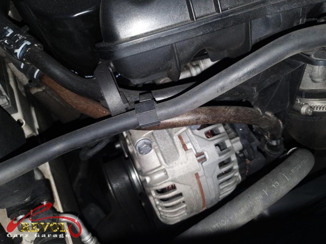 The wear-and-tear check finding the coolant leak from perished hoses.