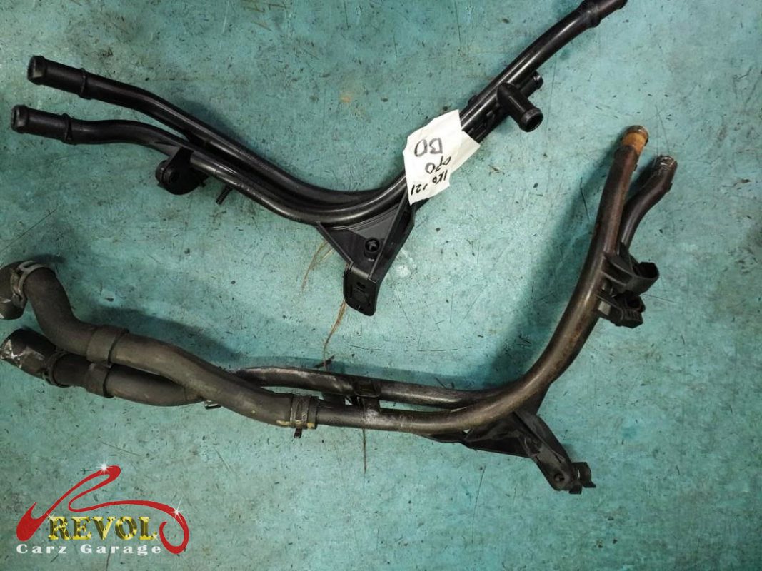The new genuine VW-spec coolant hoses and clamps ready to fit.