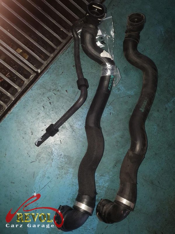 The new hoses installed and the cooling system refilled.