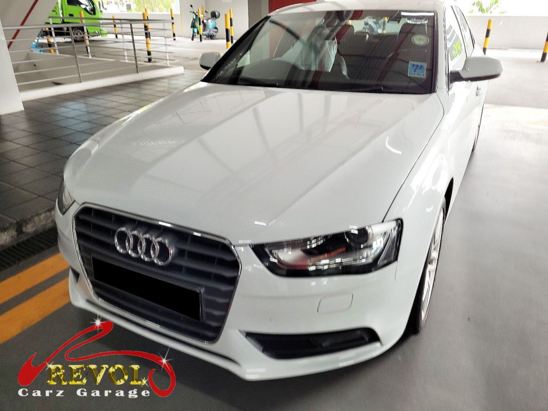 Audi A4 parked at the workshop for a service and front suspension work.