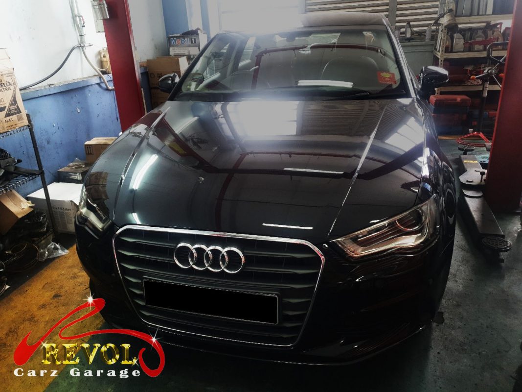 Audi A3 parked at the workshop for scheduled maintenance servicing.